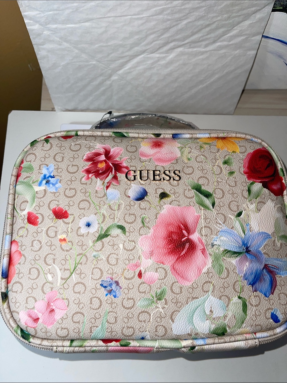GUESS Beige Floral Logo Cosmetic Case with Pink, Red, Blue Accents